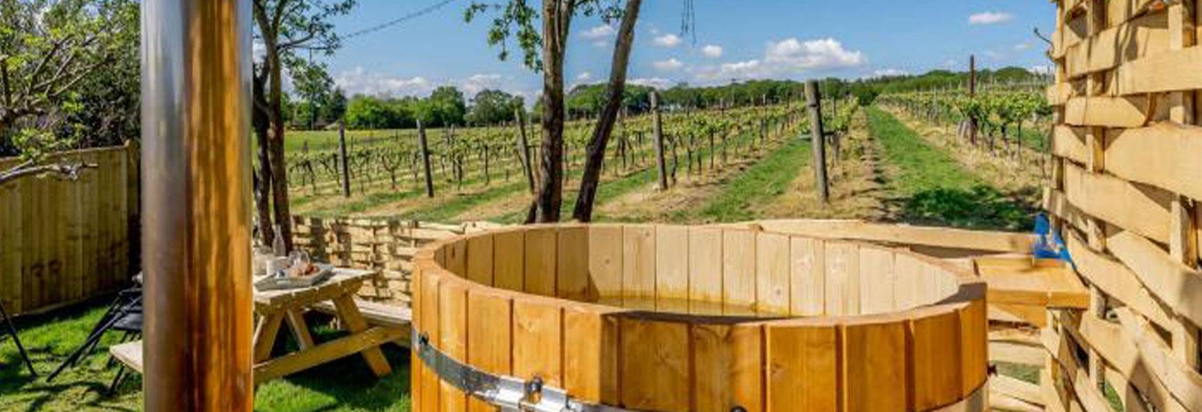 Enjoy the wood fired hot tub at The Great Escape over looking the vines at Biddenden Vineyards.  This is a glorious place to stay in the Kent countryside.  Farm shop over the road and you can drink wine from the vineyard that you are looking out over, making this a unique place to stay.