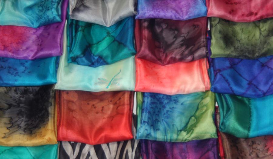 Different coloured silk scarves