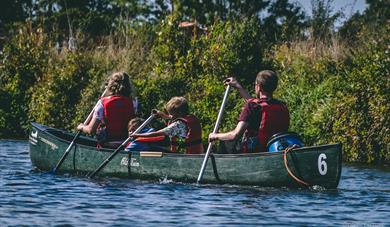 Family Canoeing on the River Medway