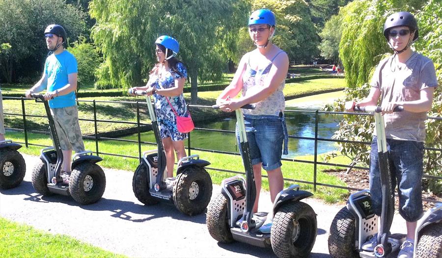 A group of people on Segways