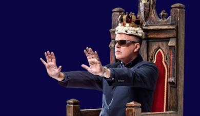 Suggs photograph on wooden throne