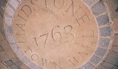Outside of Maidstone Town Hall stone with 1765 date.