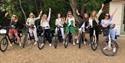 Eight ladies with bikes