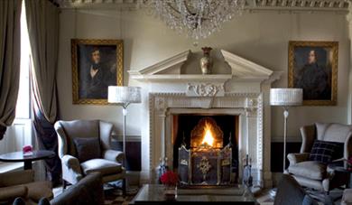 Fire place in the sitting room at Chilston Park Hotel