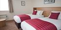 A large twin bedroom at The Weald of Kent Hotel and Golf Course in Maidstone.