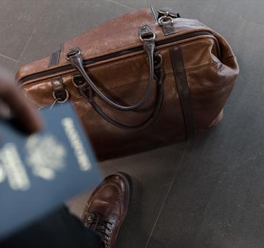 Leather hold-all with a passport