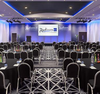 Cabaret style conference room setup at Radisson Blu Hotel Manchester Airport