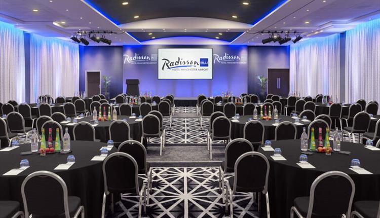 Cabaret style conference room setup at Radisson Blu Hotel Manchester Airport