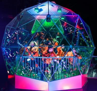 People collecting golden tickets in the Crystal Maze Manchester dome