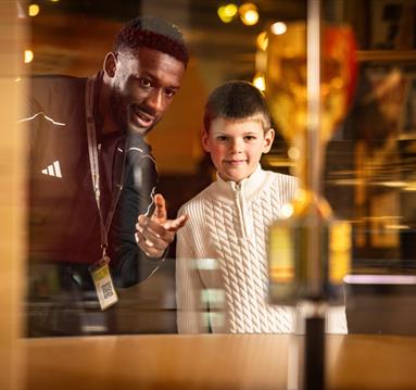 Staff and visitor at National football Museum