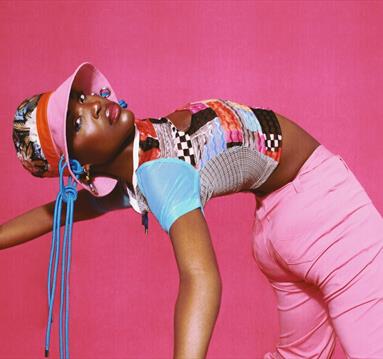 Pongo in pink outfit