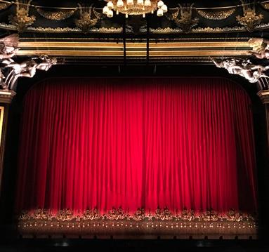 Red curtain at a performance theatre