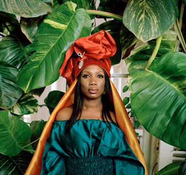 Rokia Koné, green background