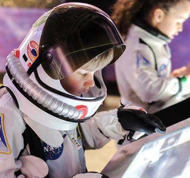 Child in an astronauts costume