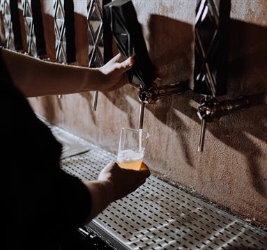 Person Holding Clear Drinking Glass
