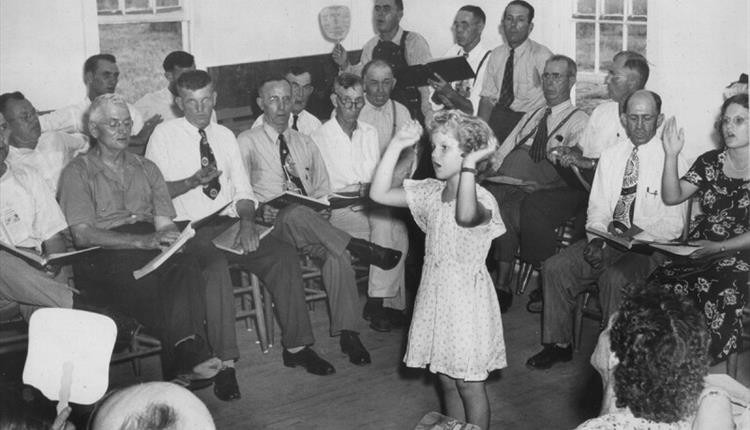 B&W image: child singing