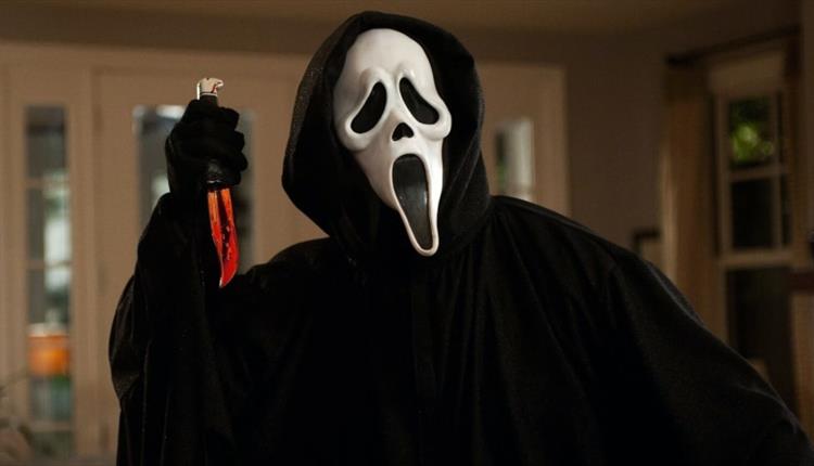 Person wearing scary mask