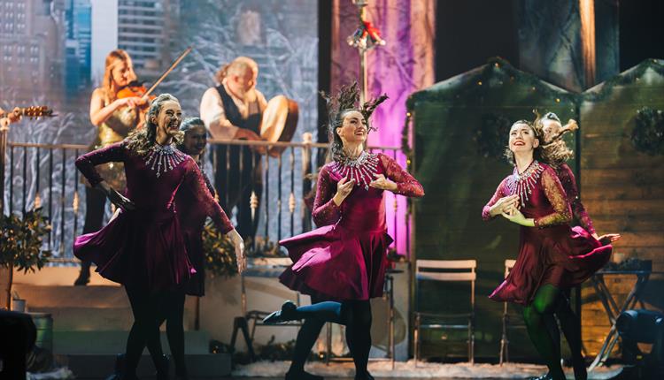 Dancers on stage at Fairytale of New York