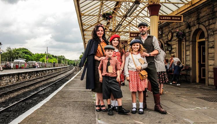 Family in 1940s outfits