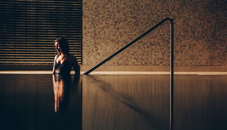 Woman inside the pool at Edwardian Hotel & Spa
