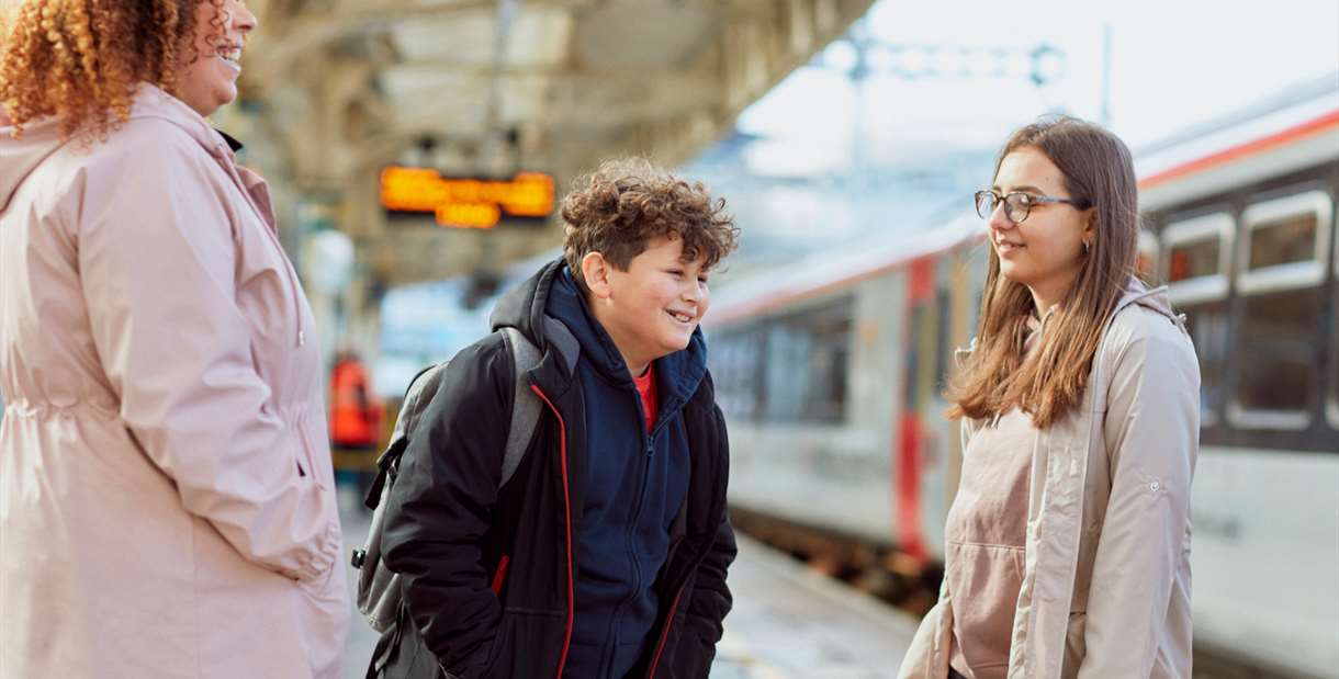Family next to a train