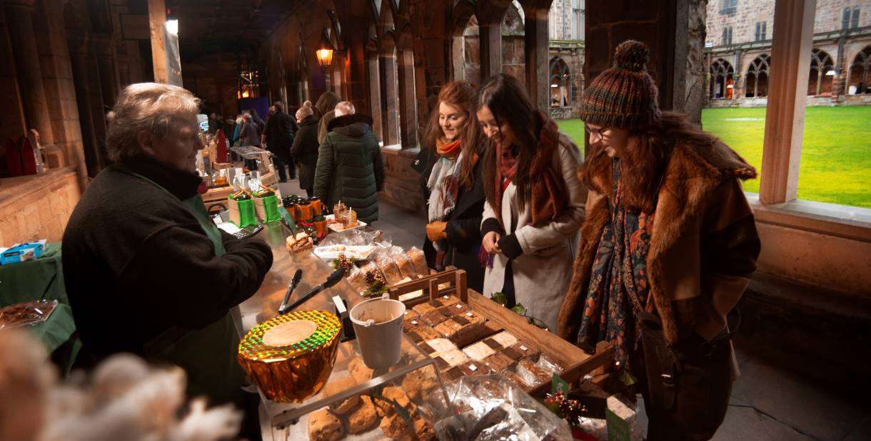 Visitors at a food stall in the christmas markets