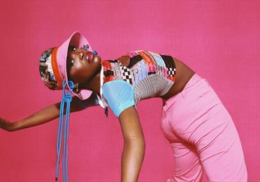 Pongo in pink outfit
