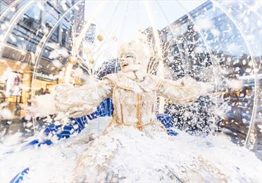 Snow queen at Festive Sundays in Manchester City Centre