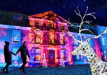 Dunham Hall lit up by the Christmas lights trail
