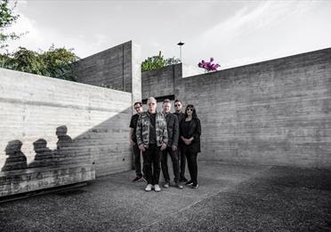 New Order stood together by Warren Jackson