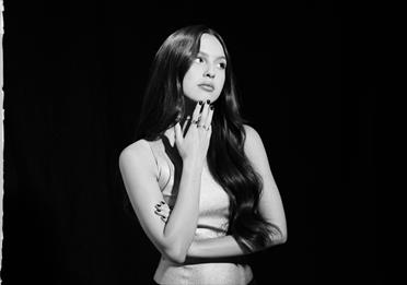 Black and white photo of Olivia Rodrigo