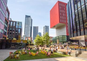 Seating outside First Street in the sun, Manchester