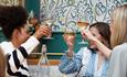 People toasting with white wine