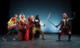 The 80s Panto cast on stage