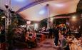 Crowd eating and drinking at Backyard Cinema