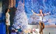 Dancer and singer on stage at Fairytale of New York