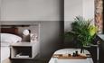 Bedroom and bath at LEVEN Manchester