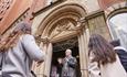 Ed Glinert leads a group on a tour of Manchester