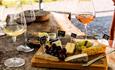 Cheese board with wine and crackers