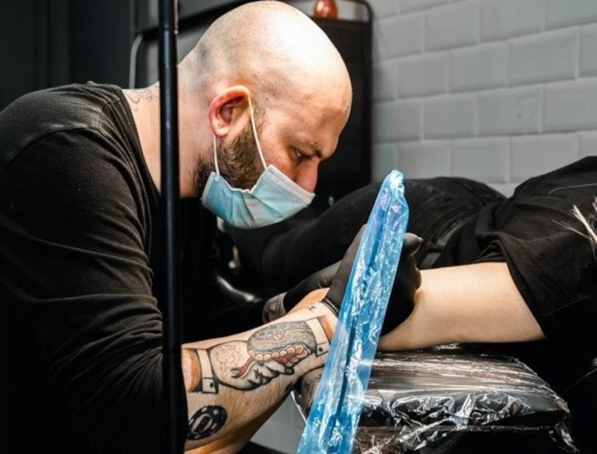 Flesh Tattoo: tattoo artists in the shadow of the City Centre's most iconic  landmarks - Visit Manchester