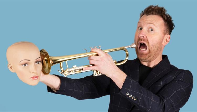 Jason Bryne with a trumpet