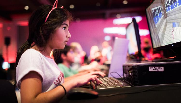 Girl playing computer game