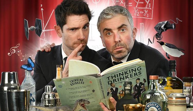 two men surrounded by drinks with a book called thinking drinkers
