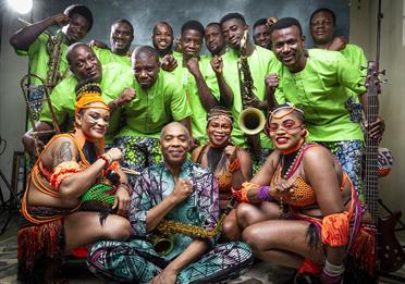Femi Kuti and the Positive Force in stage outfits