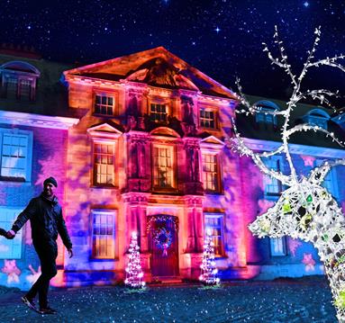 Dunham Hall lit up by the Christmas lights trail
