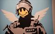The Art of Banksy police smiley