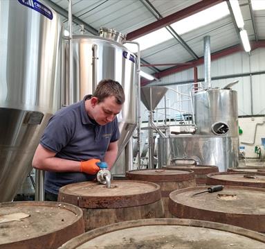 A man working in the brewery