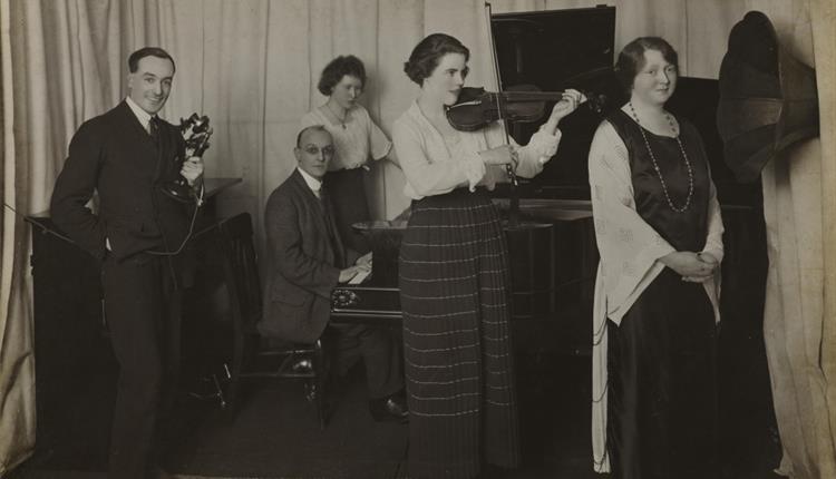 -	Photographic print of Isobelle Baillie and others performing at radio station 2ZY - © The Board of Trustees of the Science Museum