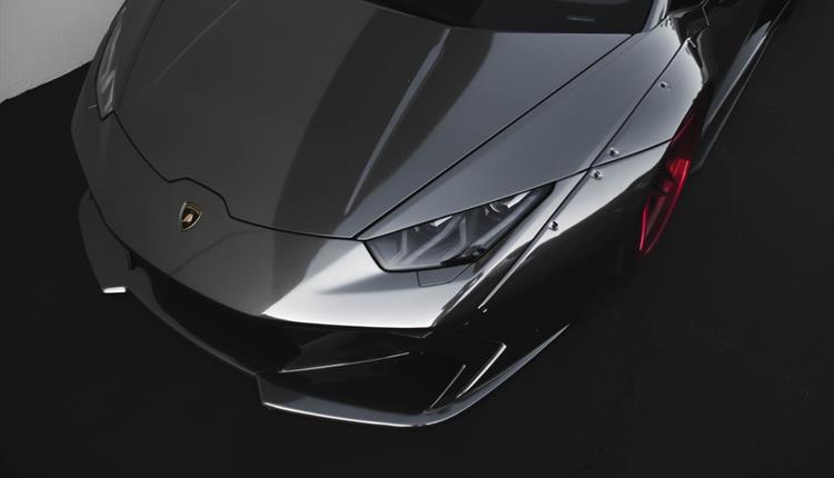 High Angle Photo of Black Lamborghini
