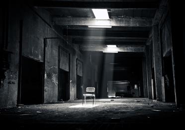 Grayscale Photo of Chair Inside the Establishment

